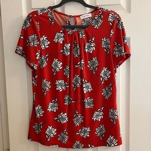 Calvin Klein pumpkin Orange with Tan and White Floral Blouse